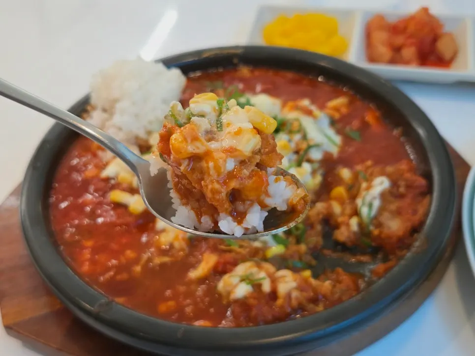 A cheese-topped piece of hot pot cutlet