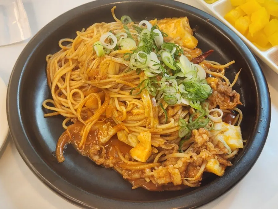 Mala stir-fried pasta with beef brisket
