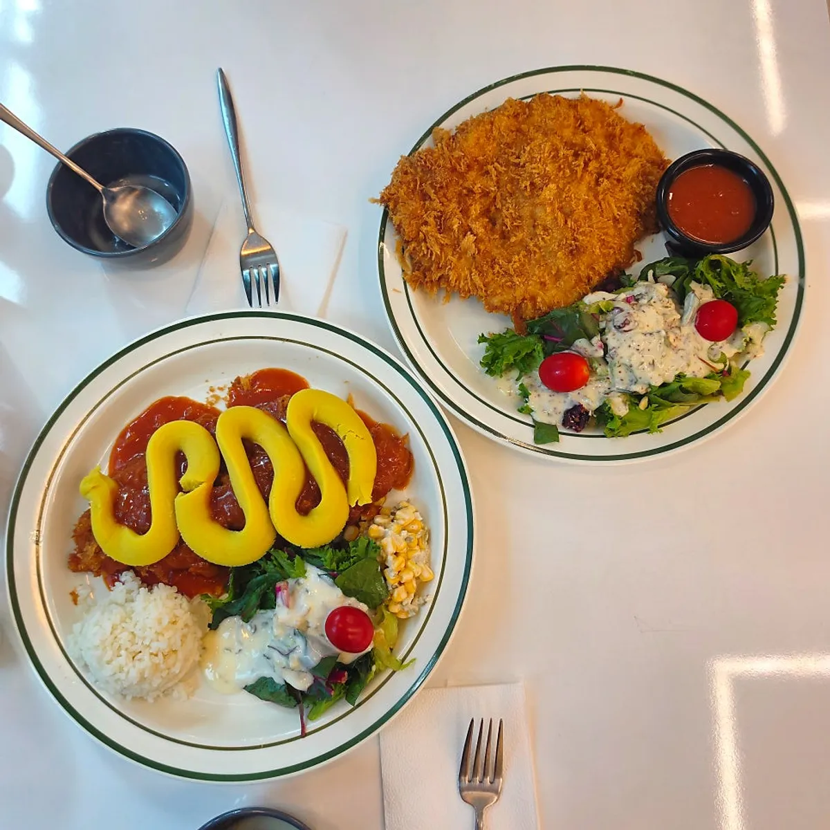 Full spread of sweet potato cheese cutlet and whole grain salad pork cutlet
