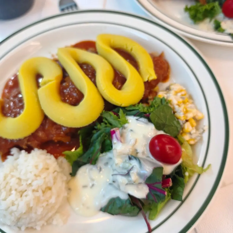 Giant pork cutlet with whole grain salad