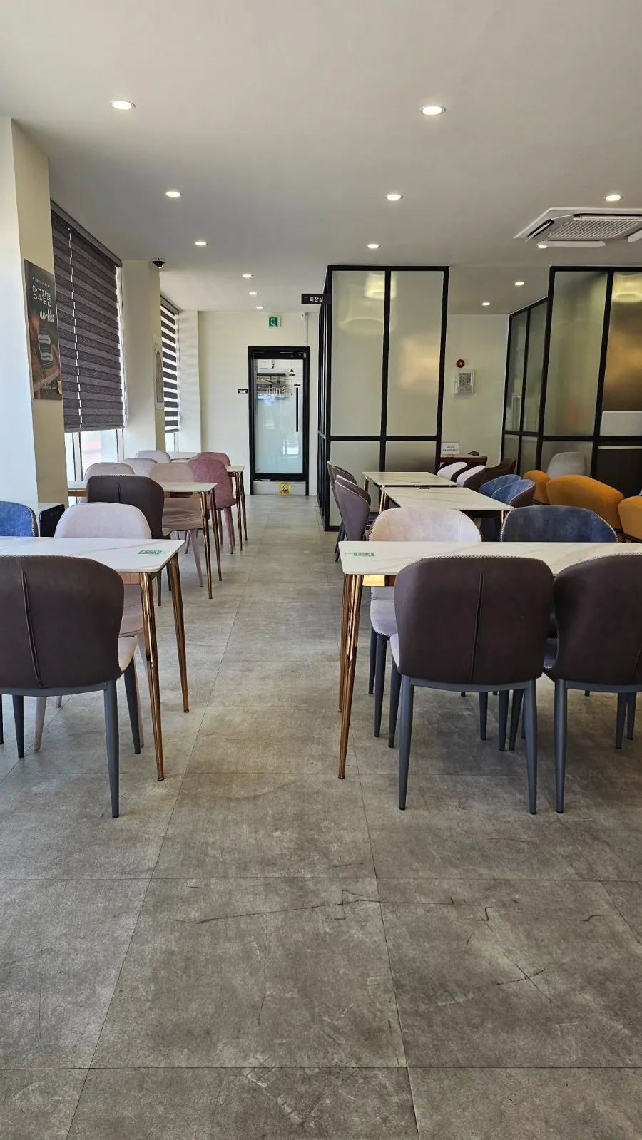 Interior of the white and wood-toned tteok café