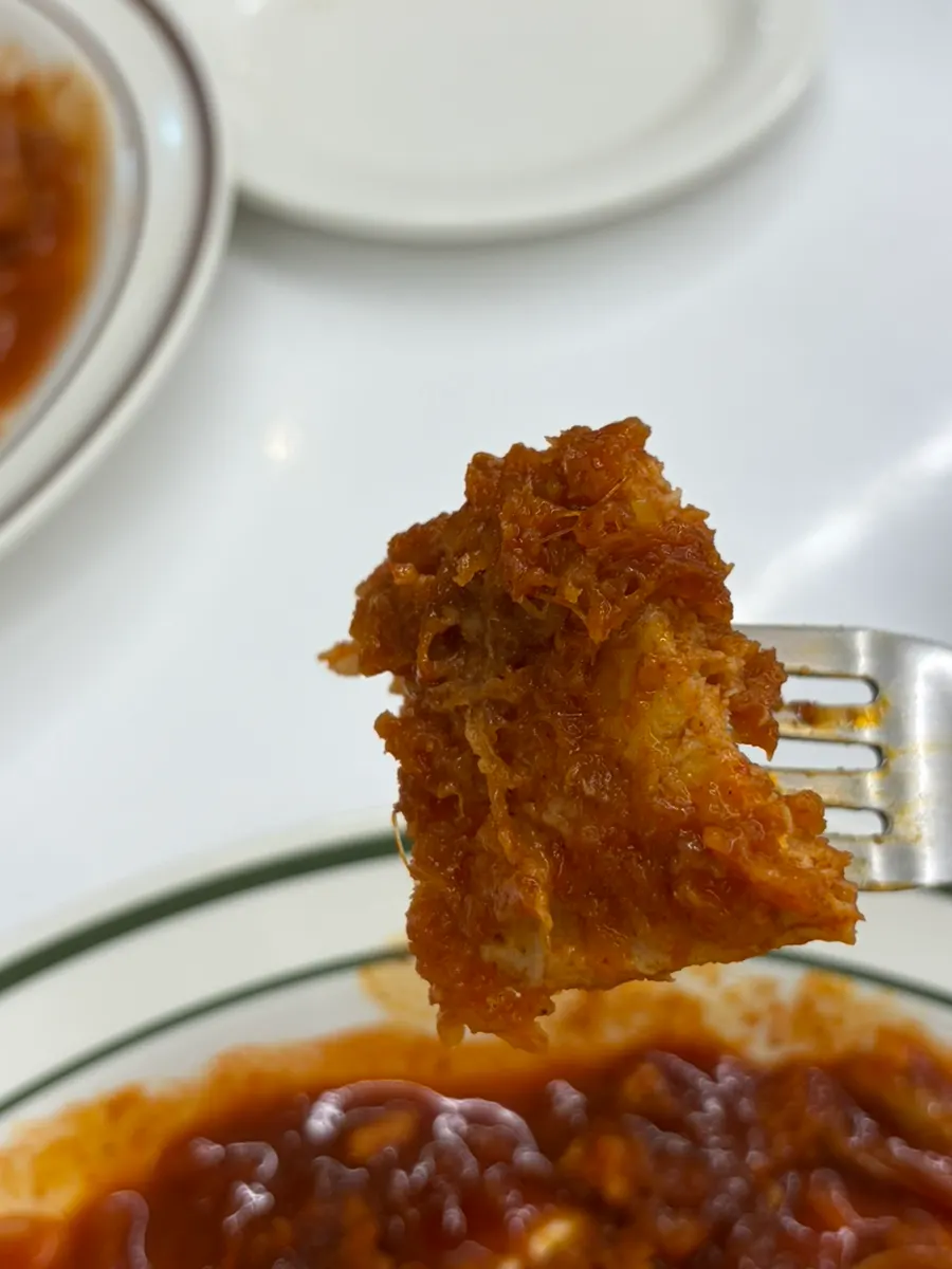 Cross-section of the thick, sauce-soaked buldak cutlet
