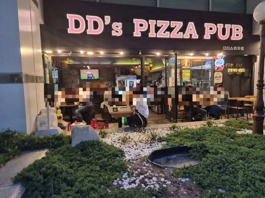 Interior seating in the main building of Didi's Pizza Pub
