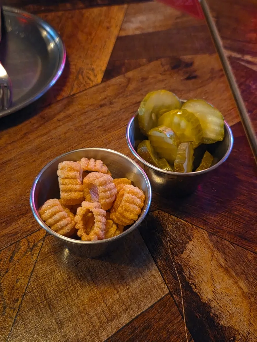 Complimentary jjanggu snack crackers and pickles