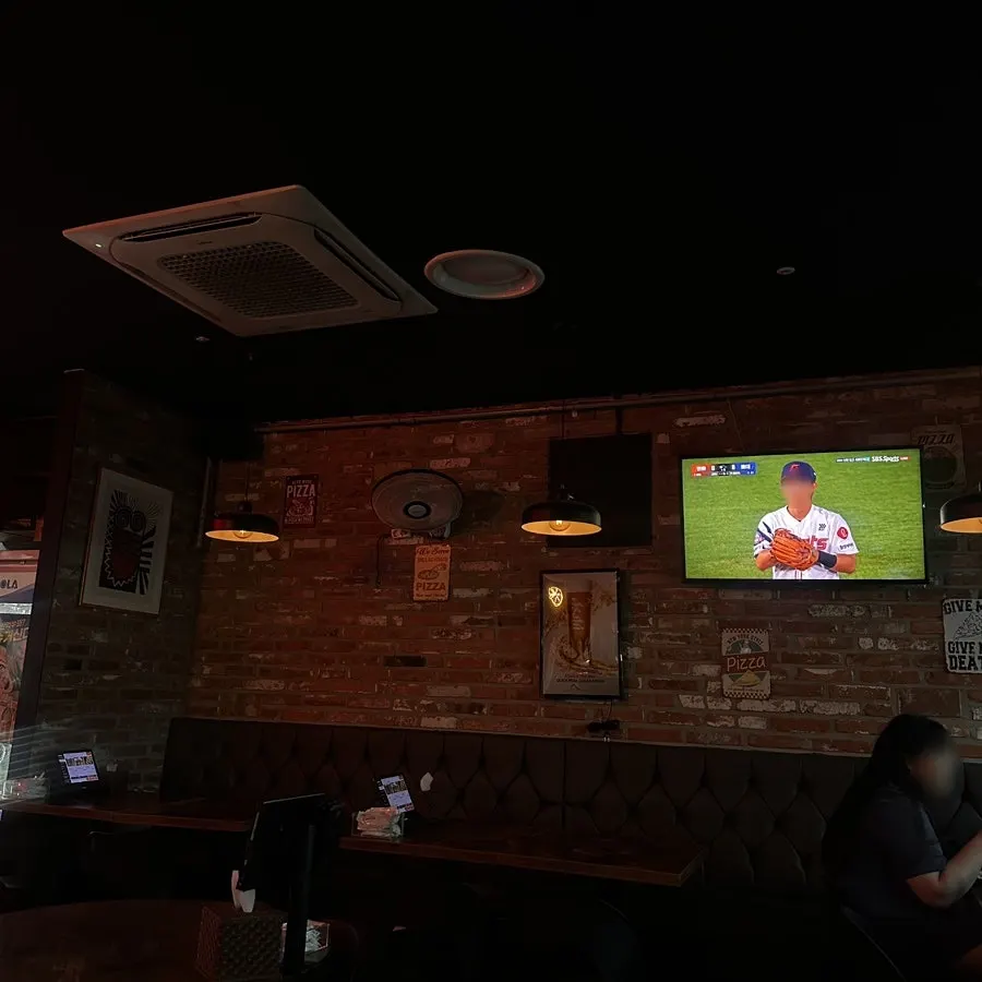 Interior of the inner storefront with a TV