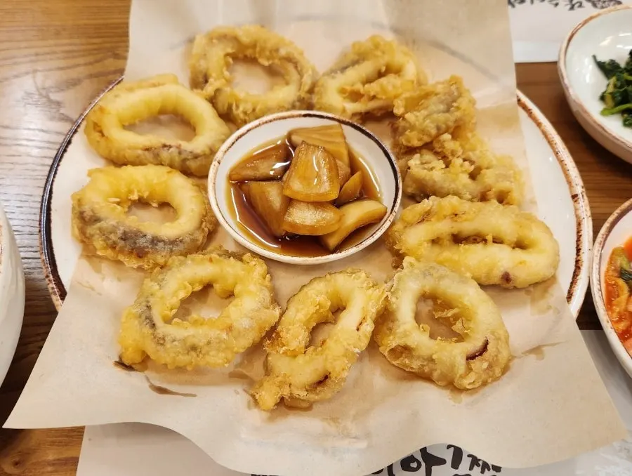 Squid fritters and pickled onions from the couple set