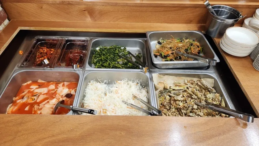 Self-serve side dish corner set up in the restaurant