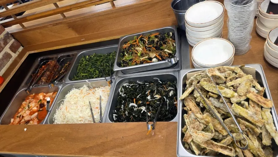 Default banchan spread including japchae