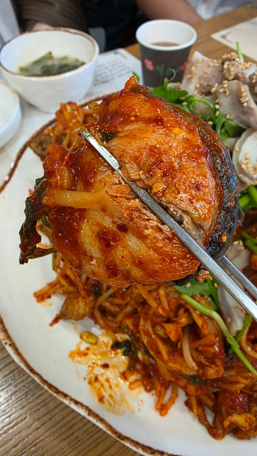 Plate of boiled monkfish with plump meat visible