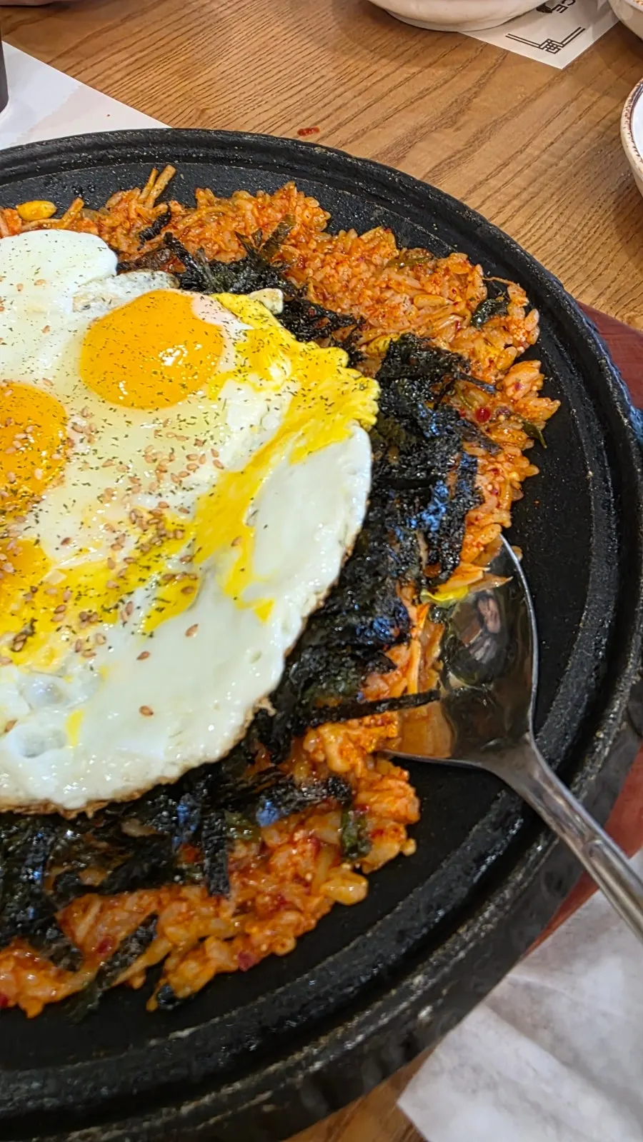 Flying fish roe fried rice served on a hot plate