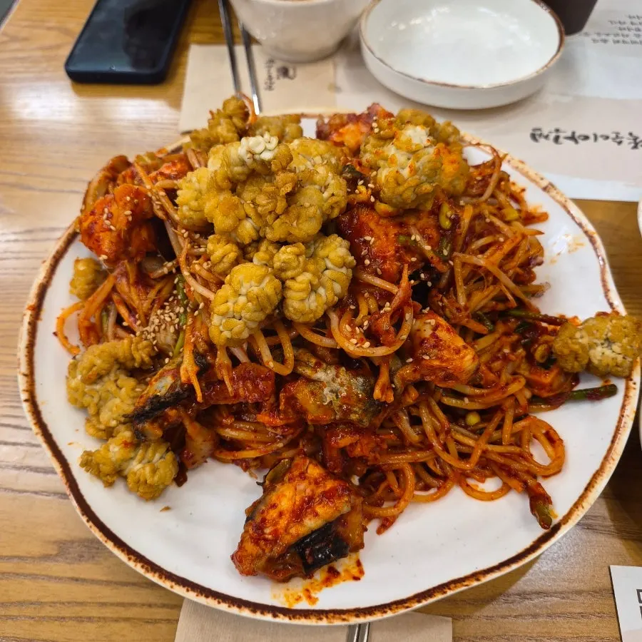 Medium-size goni-twigim agujjim piled high with fried monkfish roe