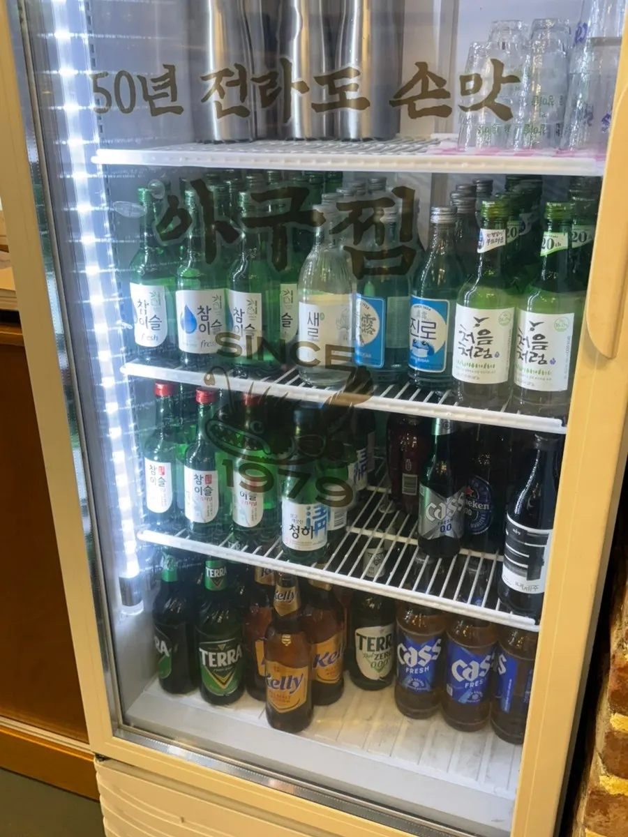 Fridge stocked with drinks and alcohol