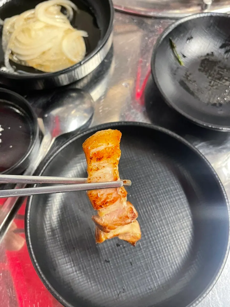 Pork belly wrapped in lettuce