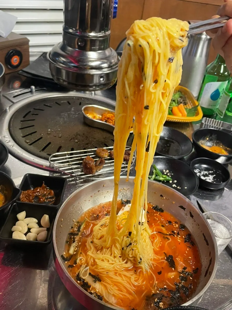 Generous bowl of kimchi-mari guksu