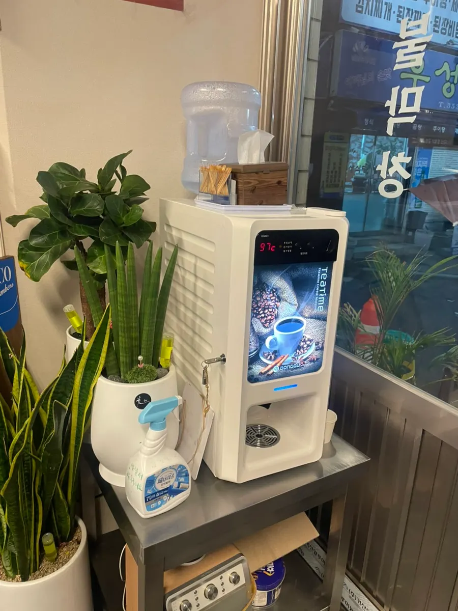 Coffee vending machine and toothpicks near the exit