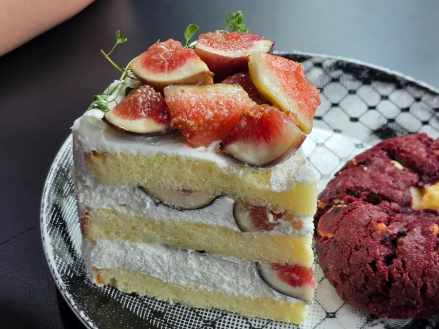 A slice of fig yogurt cream cake