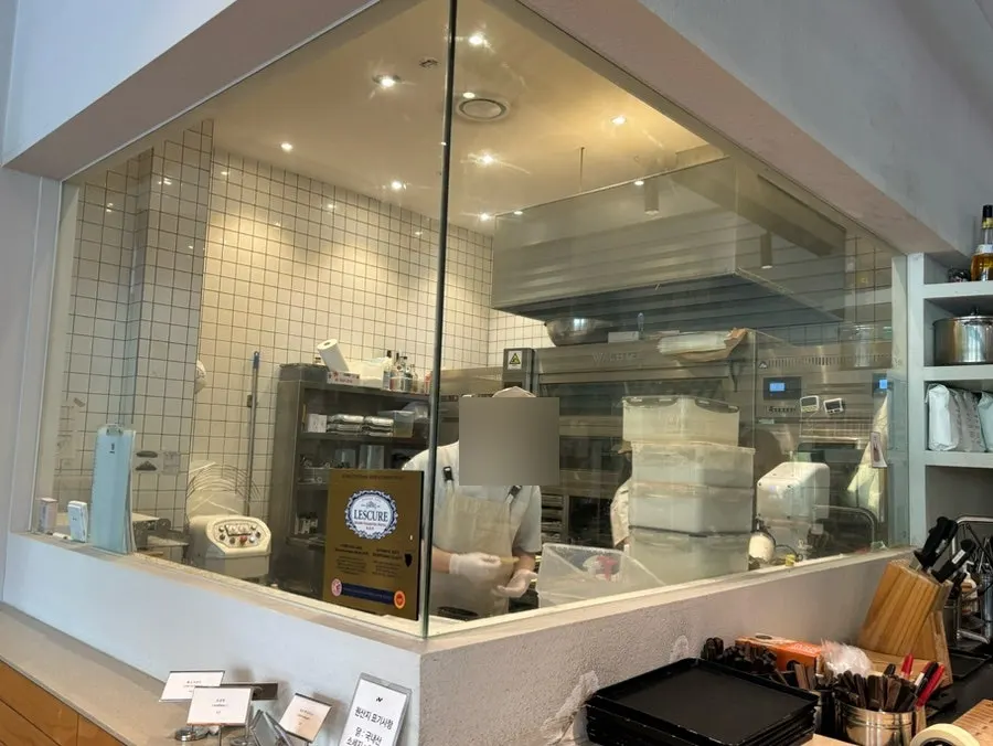 Bakery work space visible through the glass window