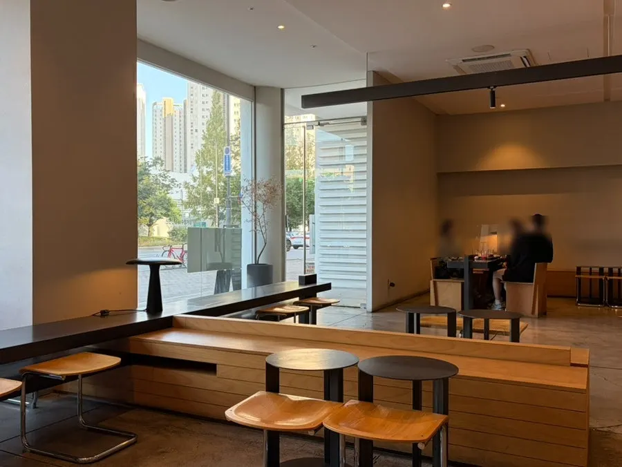 Seating by the floor-to-ceiling windows at Degree Gojan Branch