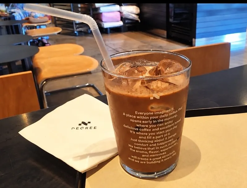 A glass of rich chocolate latte