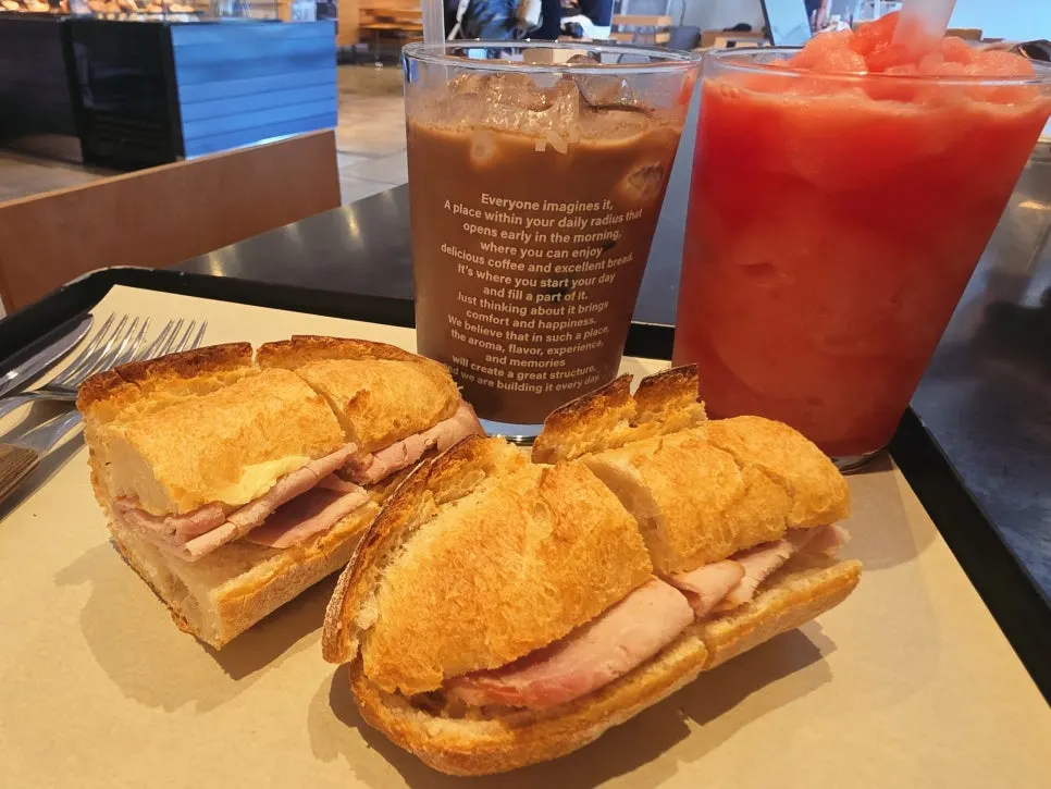 Chocolate latte and bread on the table