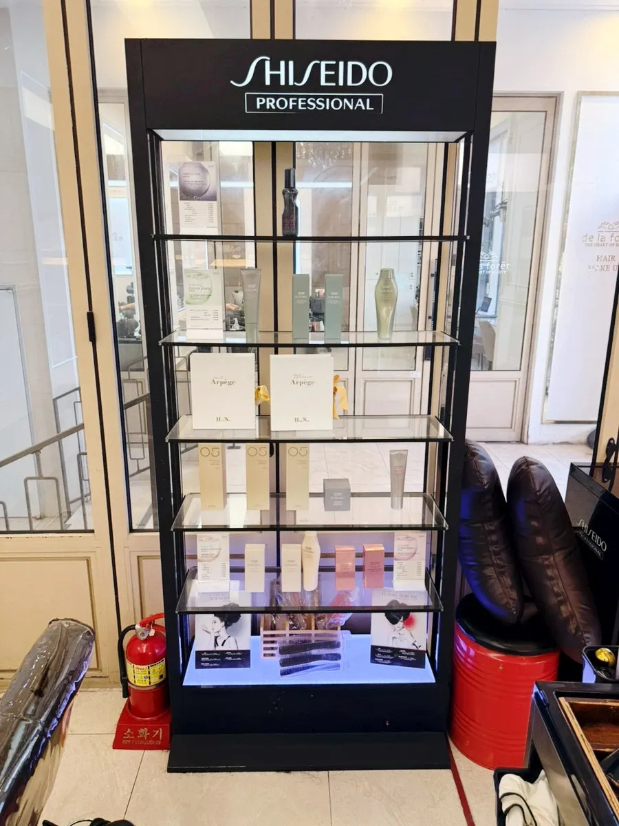 Neatly arranged salon interior under bright lighting