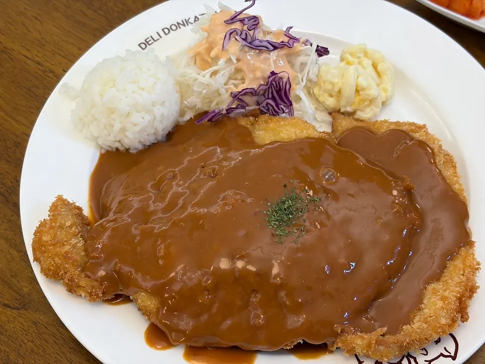 A generous plate of jumbo Western-style pork cutlet