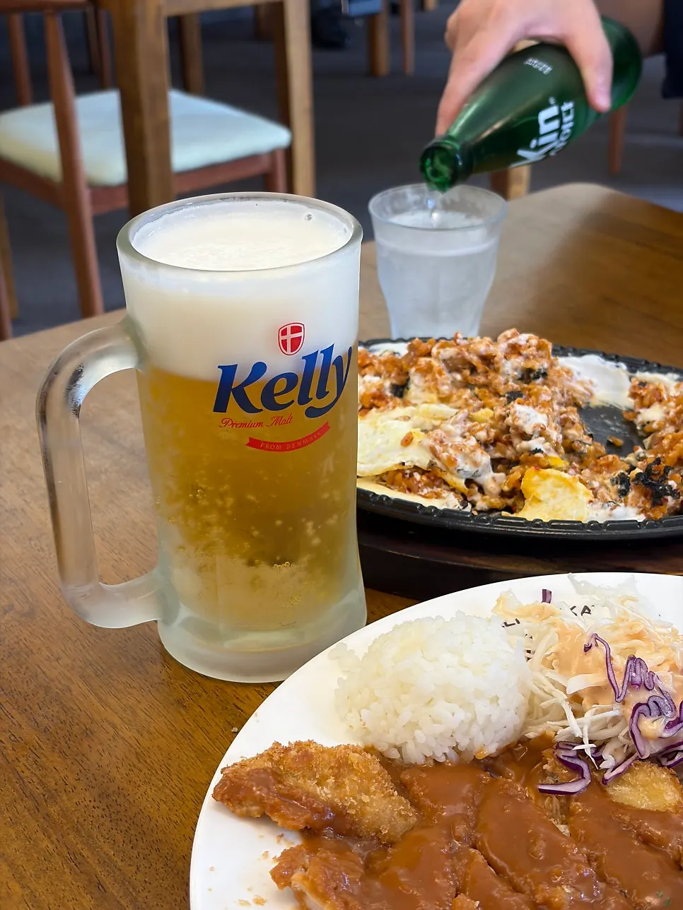 A glass of draft beer served with the cutlet