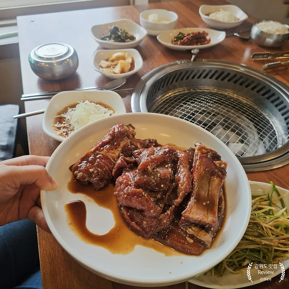 Hand-butchered pork galbi, 250g serving, plated