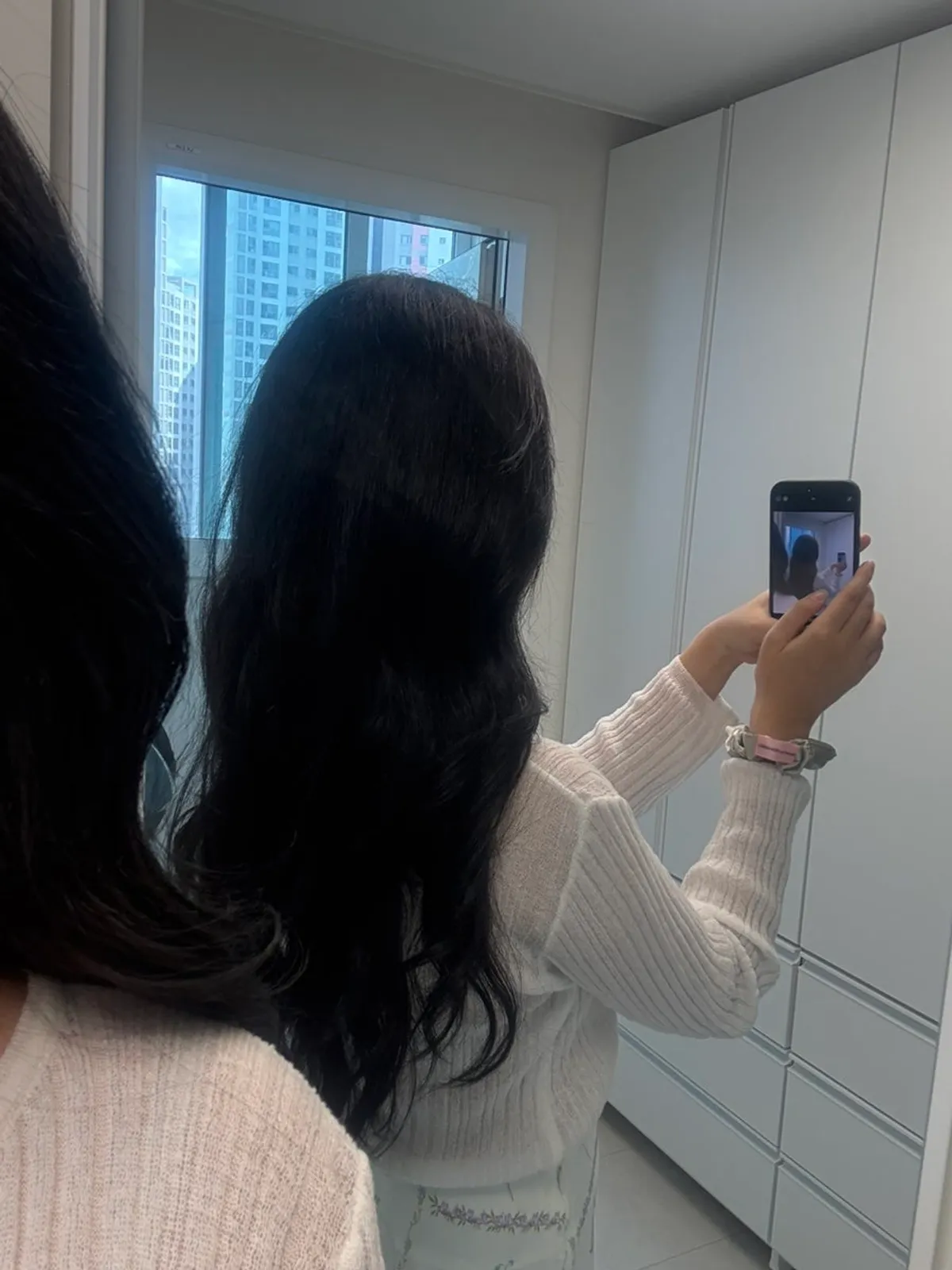Hair after finishing the silver brown tone-down dye