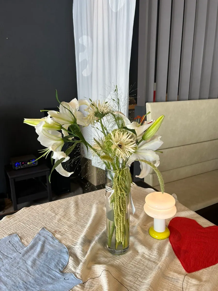 Fresh flowers placed on the shared service table