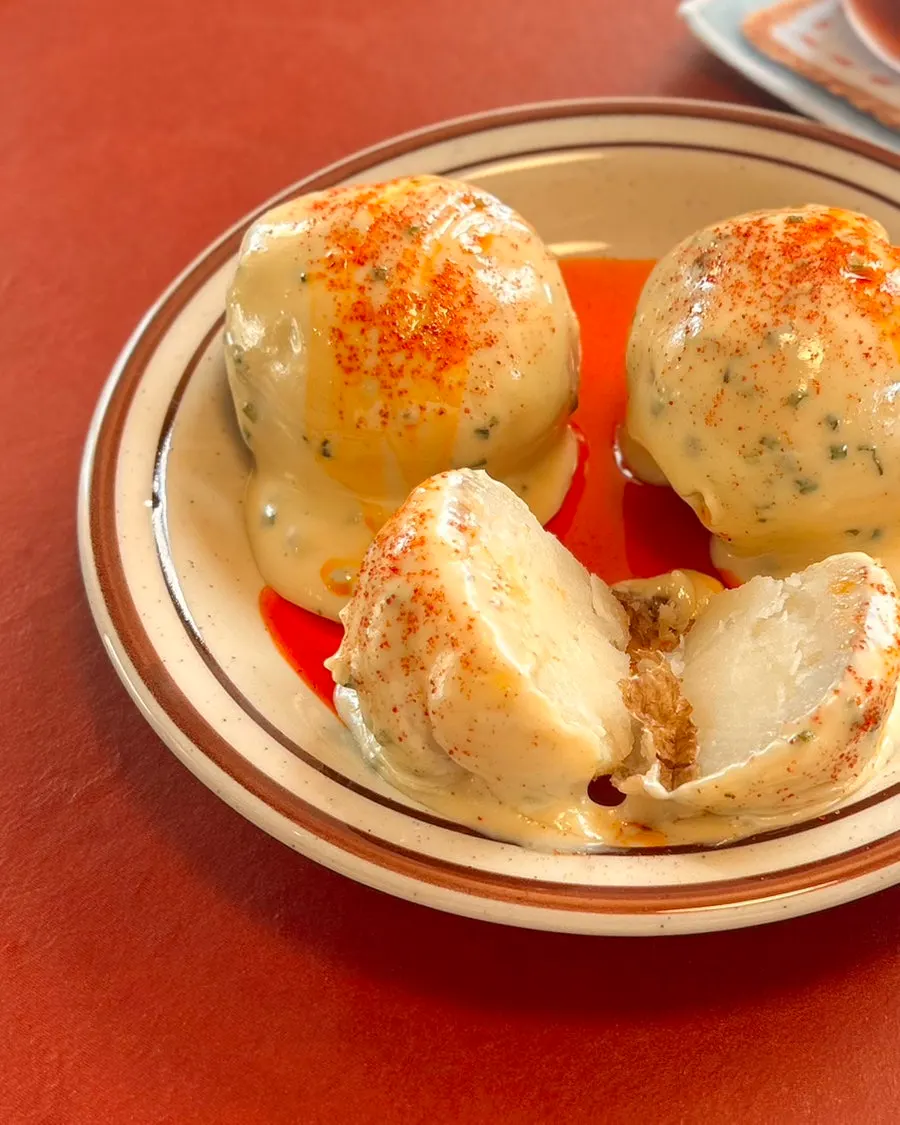 Close-up of aioli potatoes with sauce