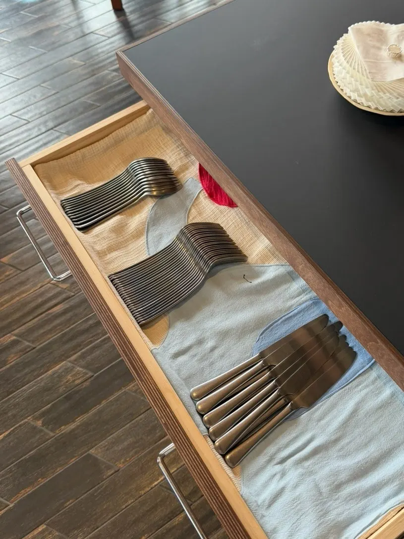 Cutlery corner at the self-serve bar with spoons and forks