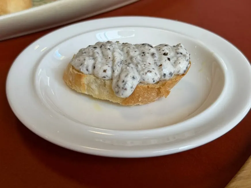Bite-size open sandwich topped with shrimp rémoulade