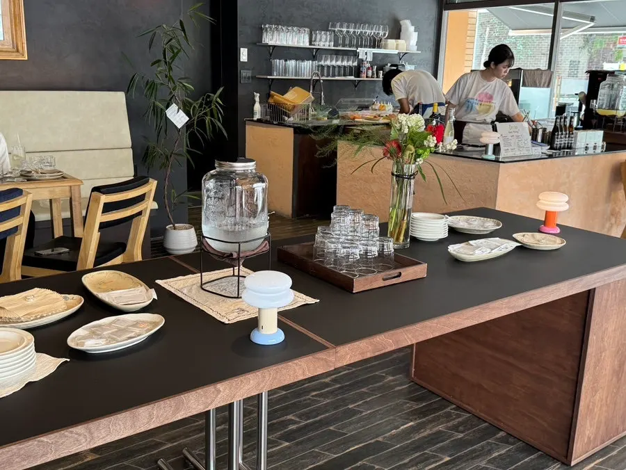 Knife and fork placed at the center of the table