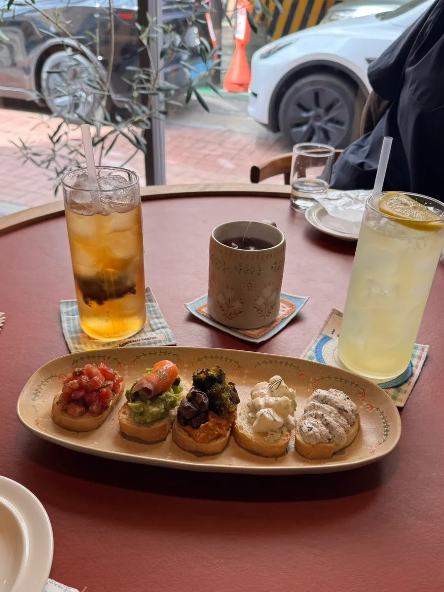 Dento's open sandwiches and drinks laid out on the table