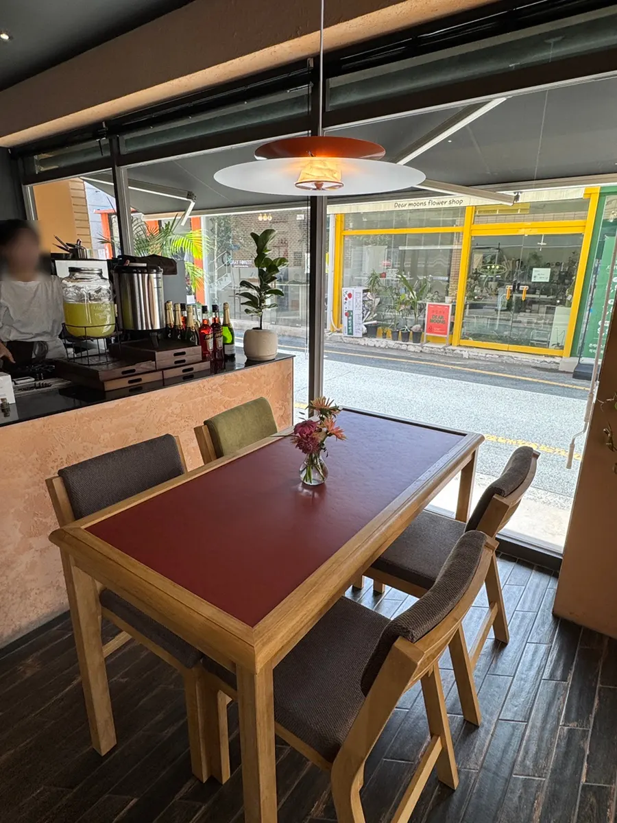 Sunlit window seating at Dento