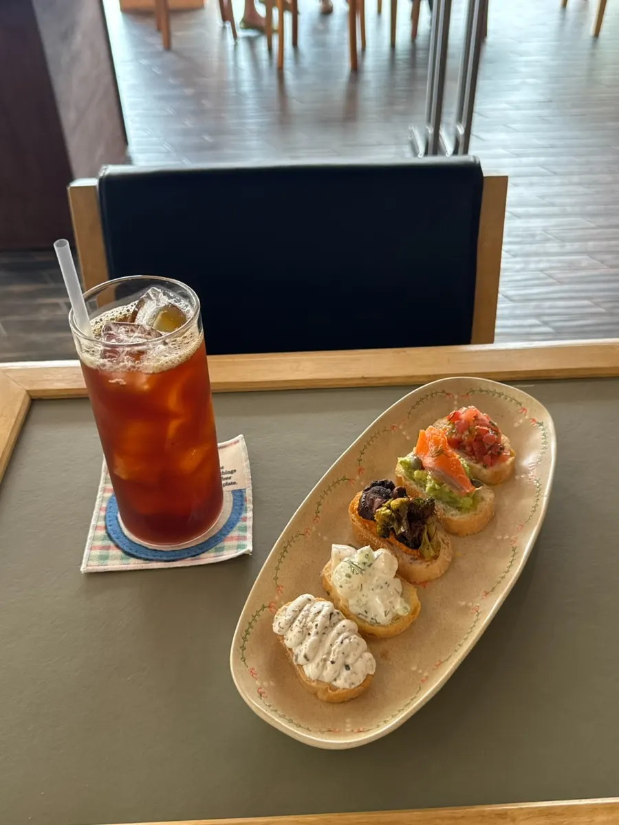 An open sandwich tasted in a single bite