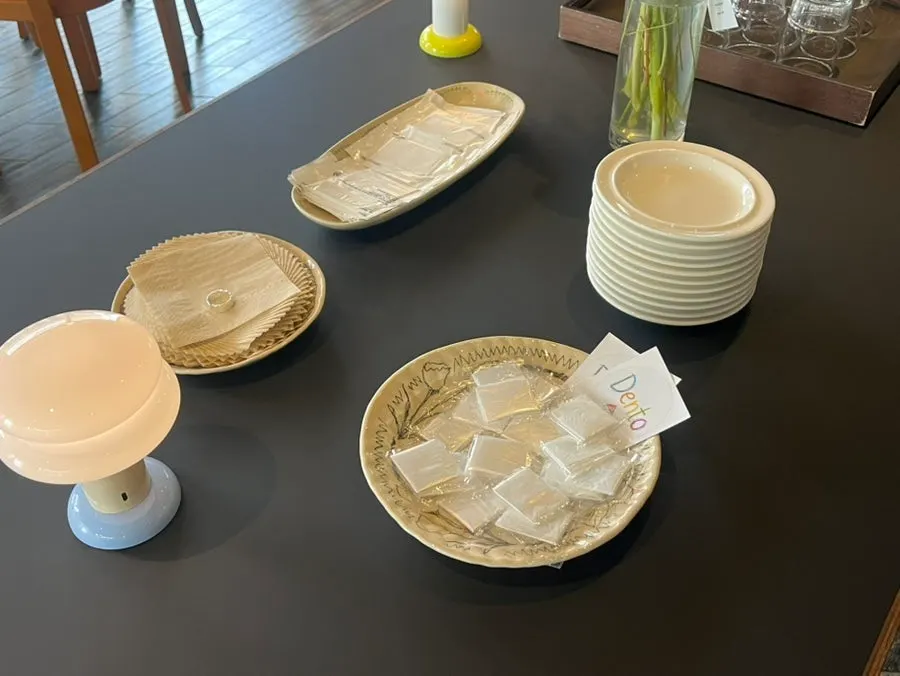 Dento's self-service zone with water and utensils
