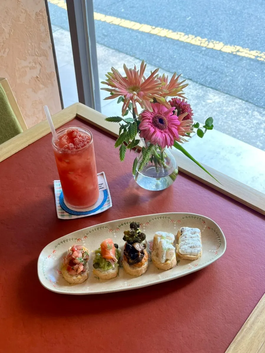 Plate of open sandwiches on the table