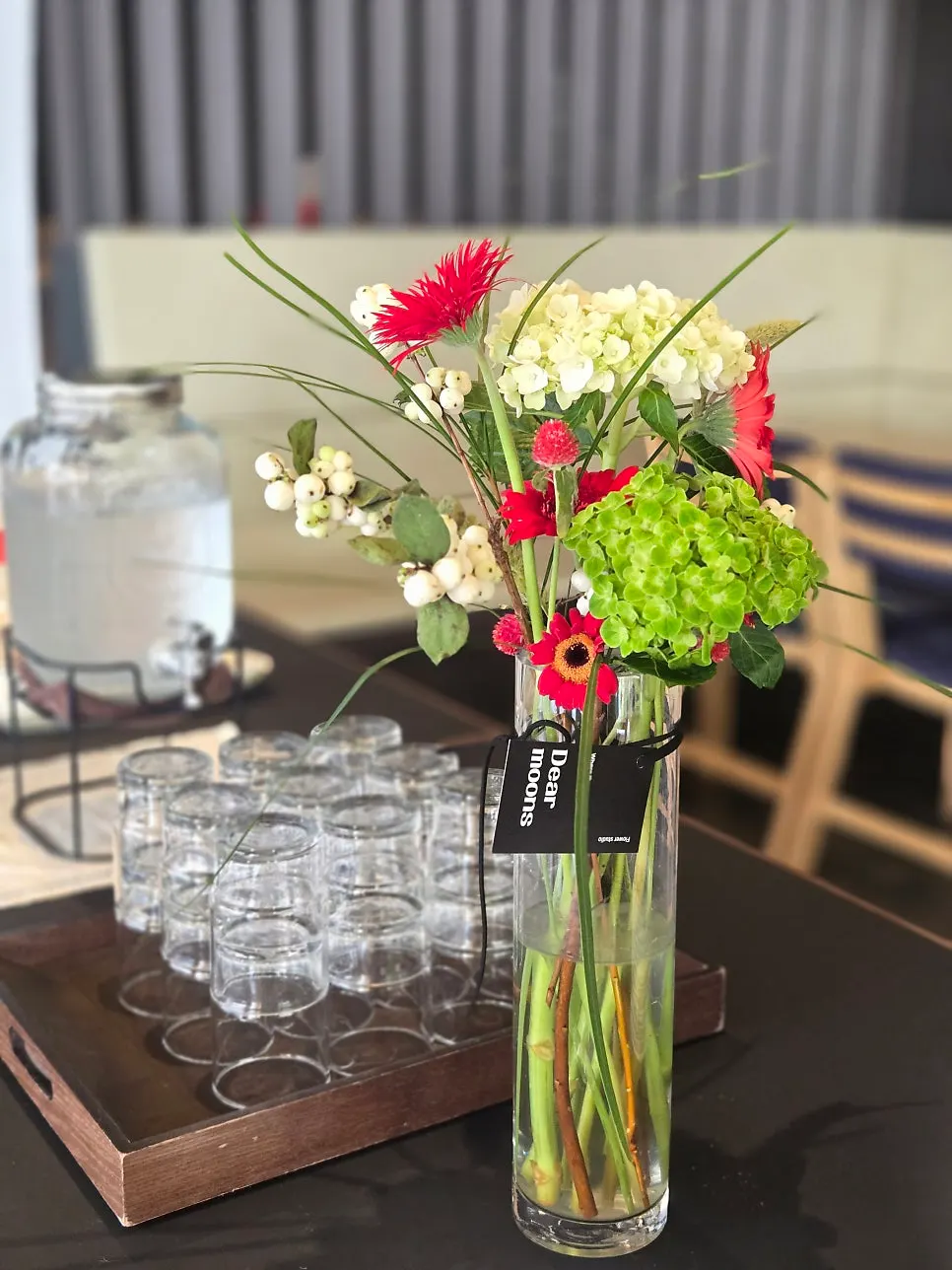 Inside Dento with fresh flowers placed on the tables