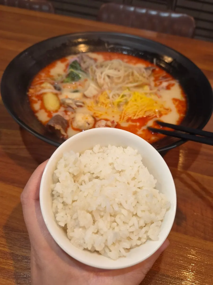 Mala tang paired with a bowl of rice