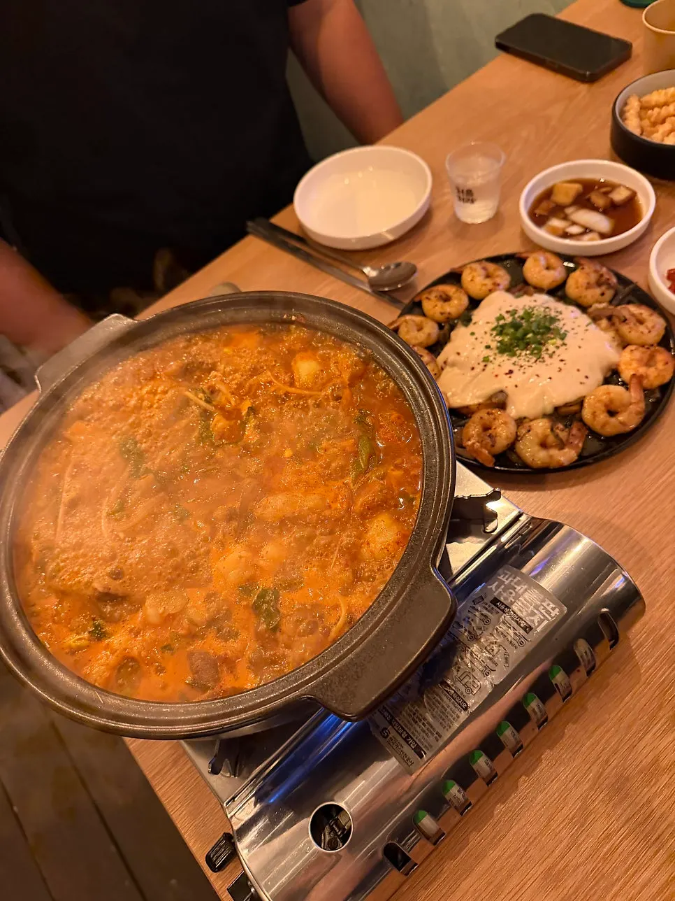 The hot pot with its broth reduced further