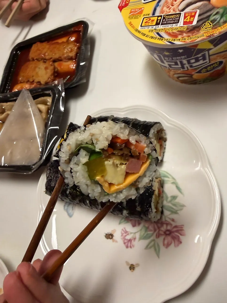 A bowl of garaetteok tteokbokki eaten at home