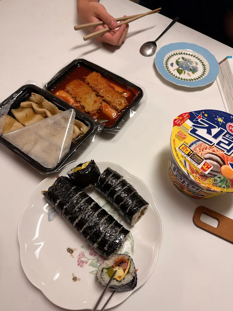 Table setting of tteokbokki, eomuk and gimbap