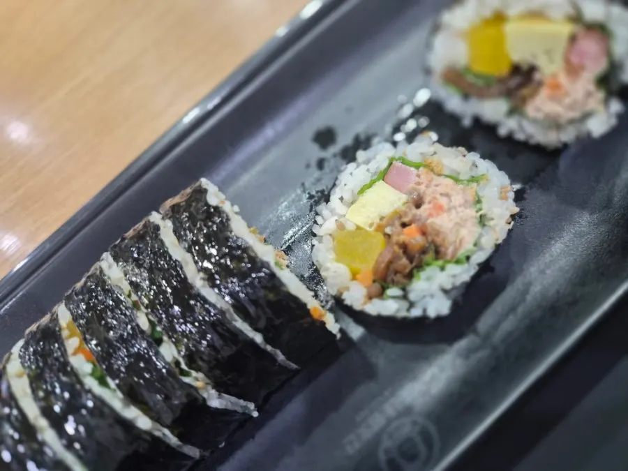 A plate of tuna gimbap with generous filling