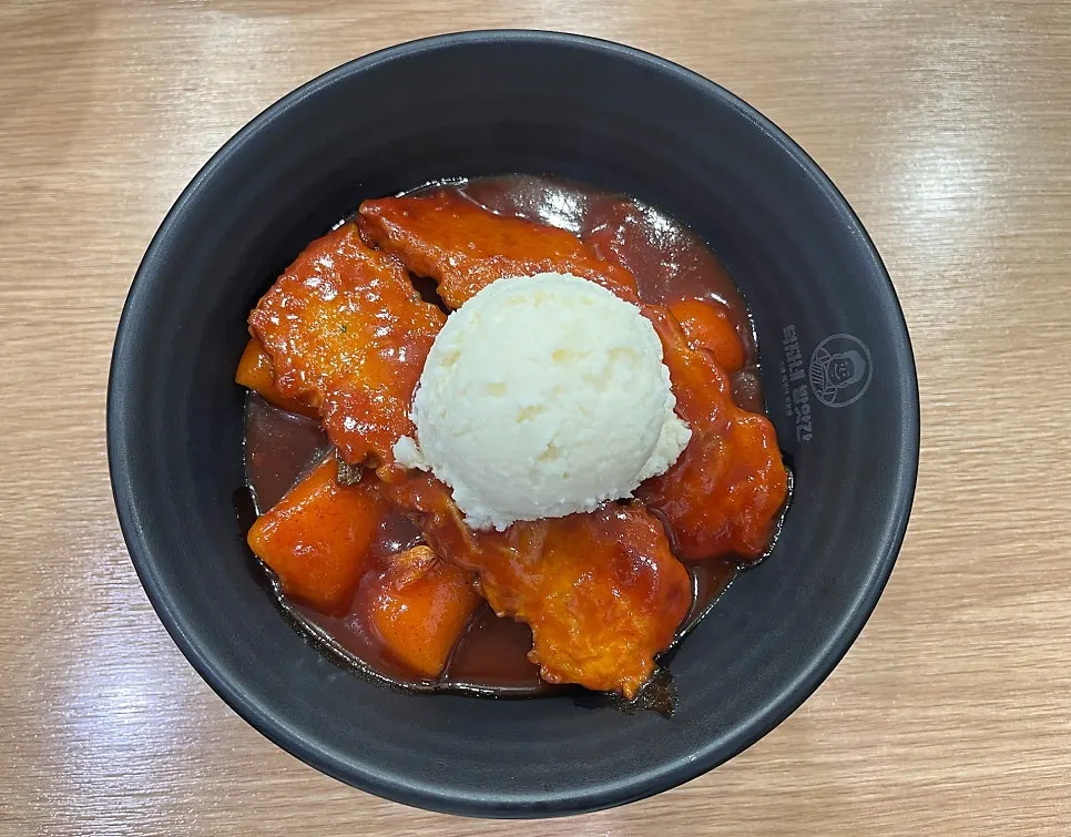 Garaetteok tteokbokki topped with potato salad
