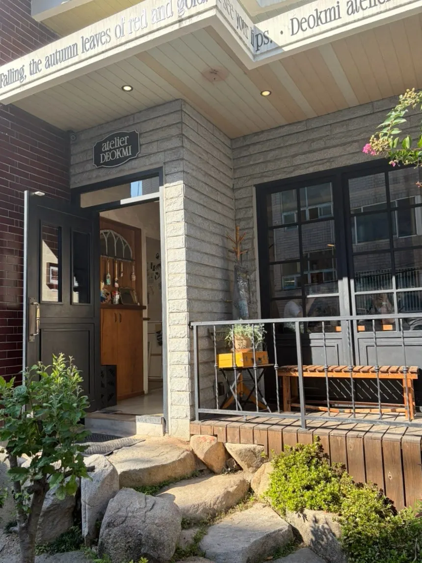 Sunlit exterior of a vintage café in Gwangalli
