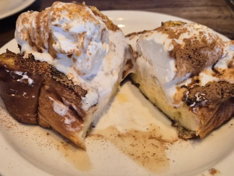 French toast topped with sugar brûlée and cinnamon powder