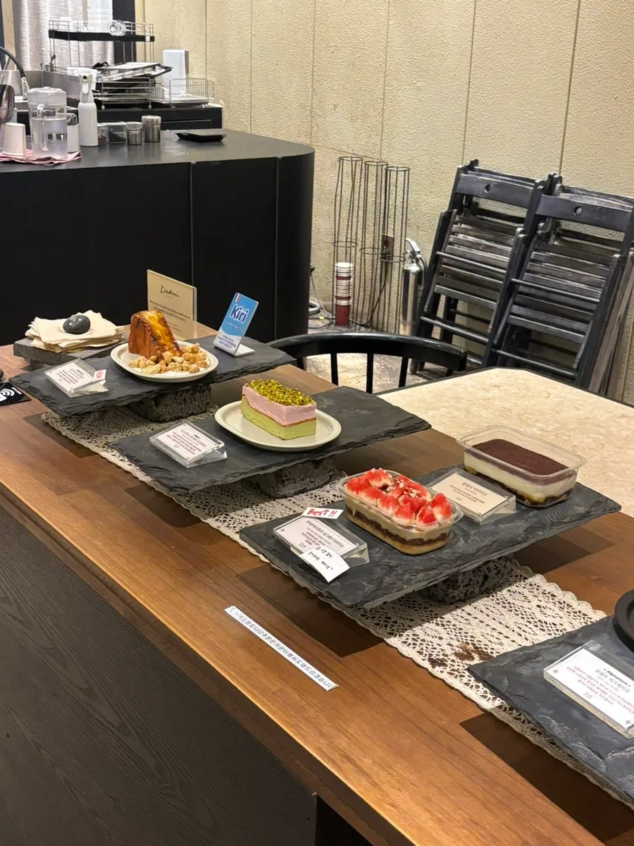 Coffee and non-coffee menu board at Deokmi Gijang Branch