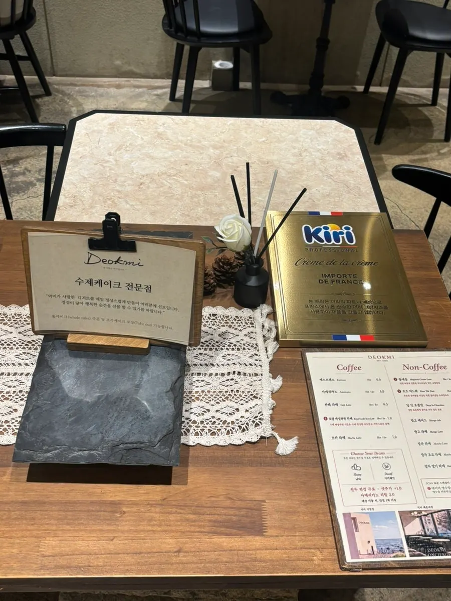 Tea collection menu board at Deokmi Gijang Branch